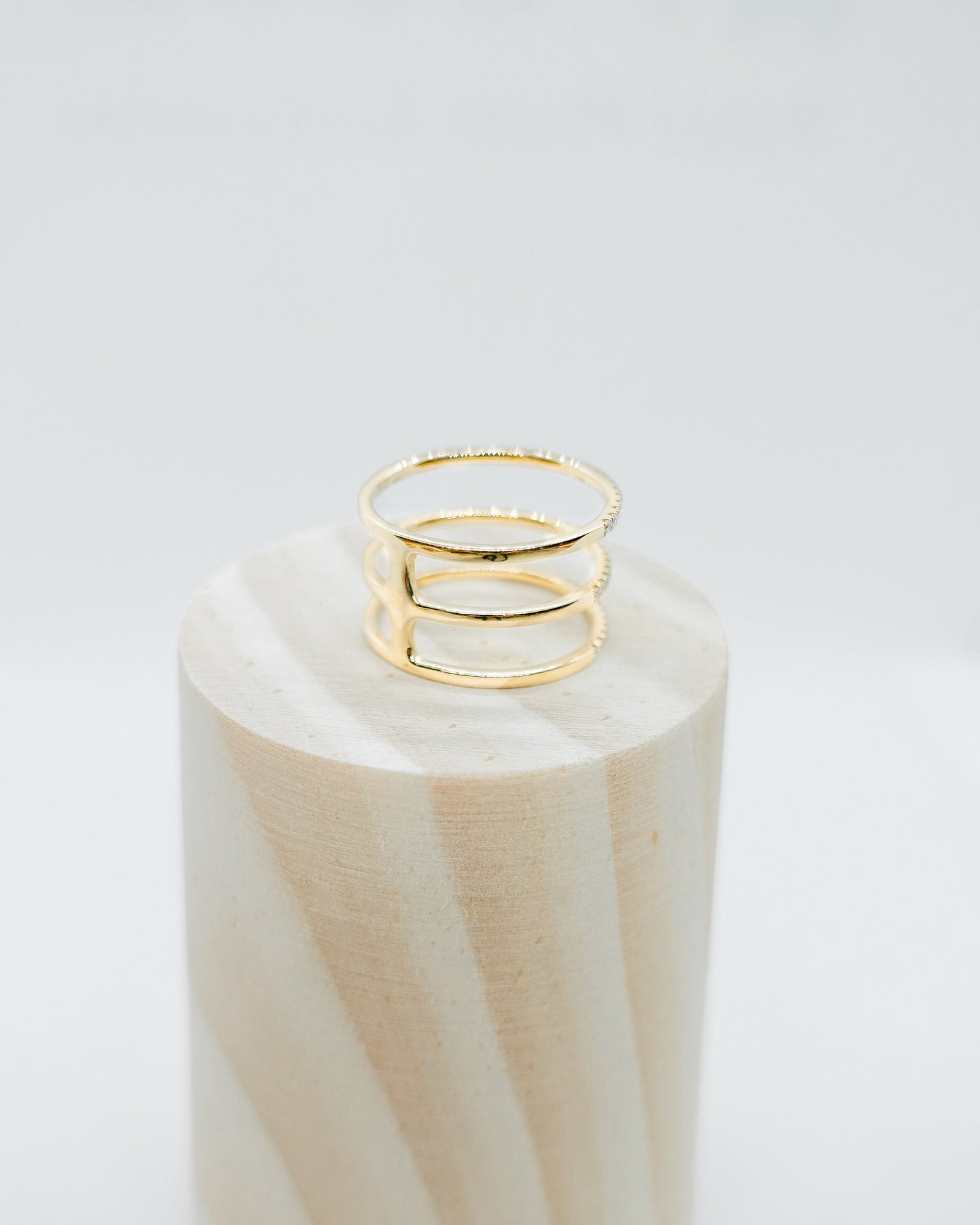 triple-row pavé diamond cage ring