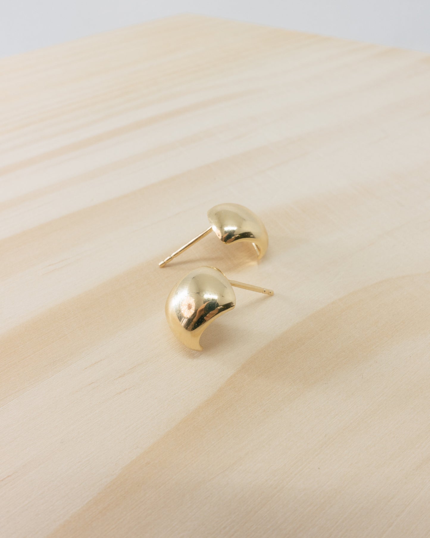 "Luc" high shine huggie studs