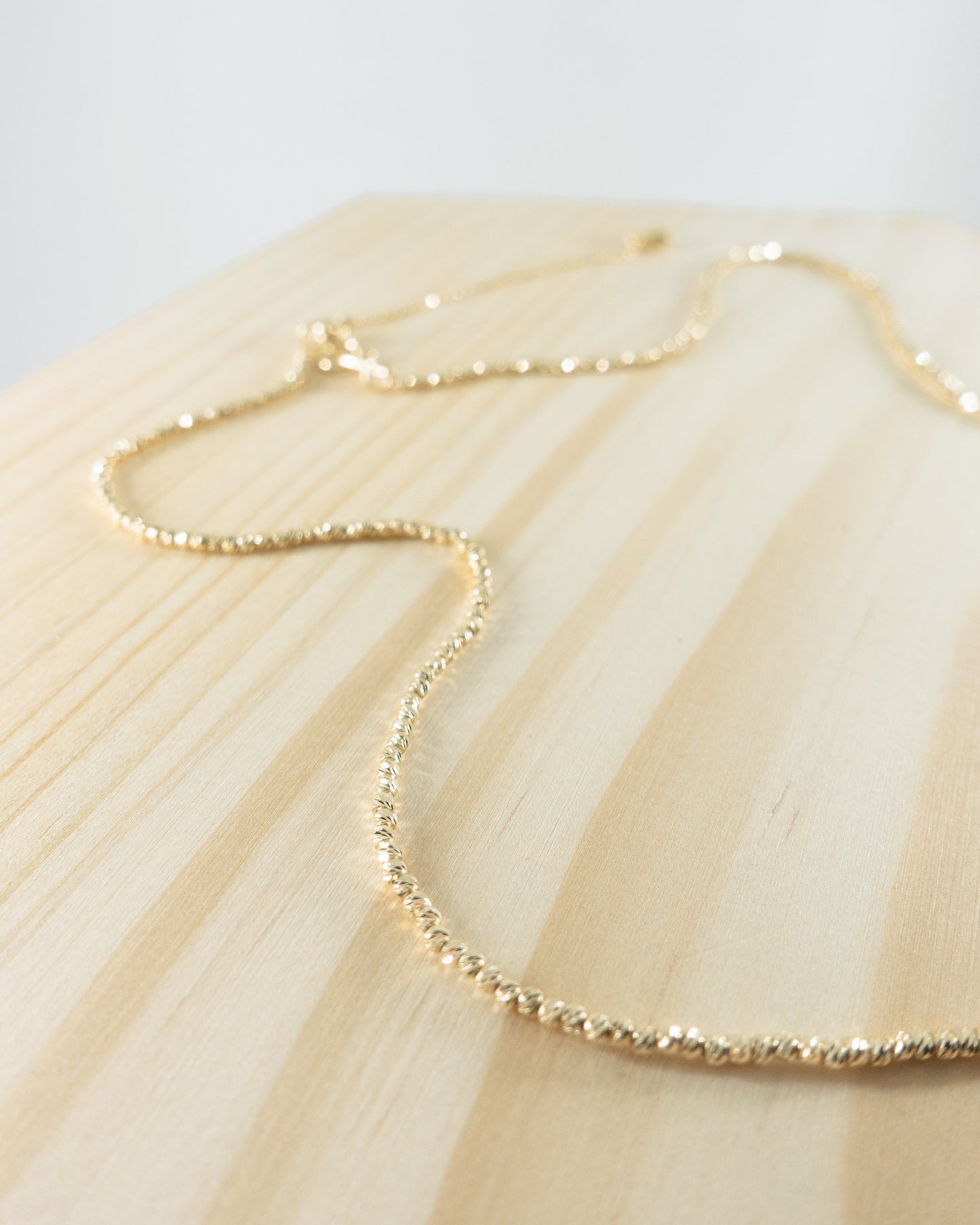 "Danny" high shine laser cut beaded necklace