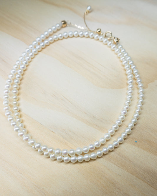 Petite pearl wire necklace