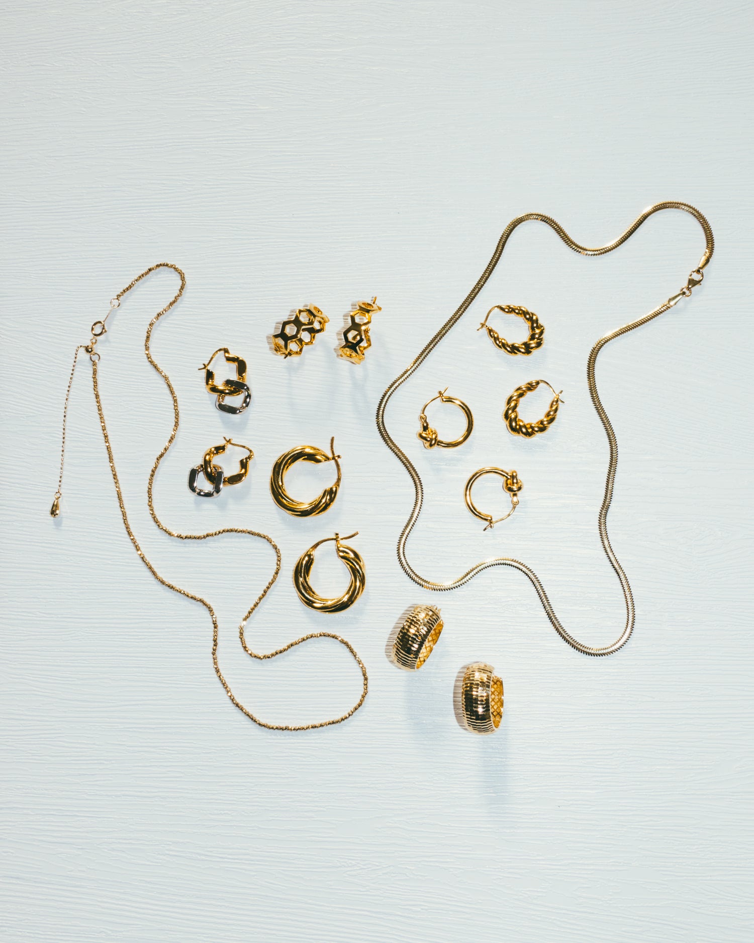 18k solid gold collections with varies earrings, rings and necklaces