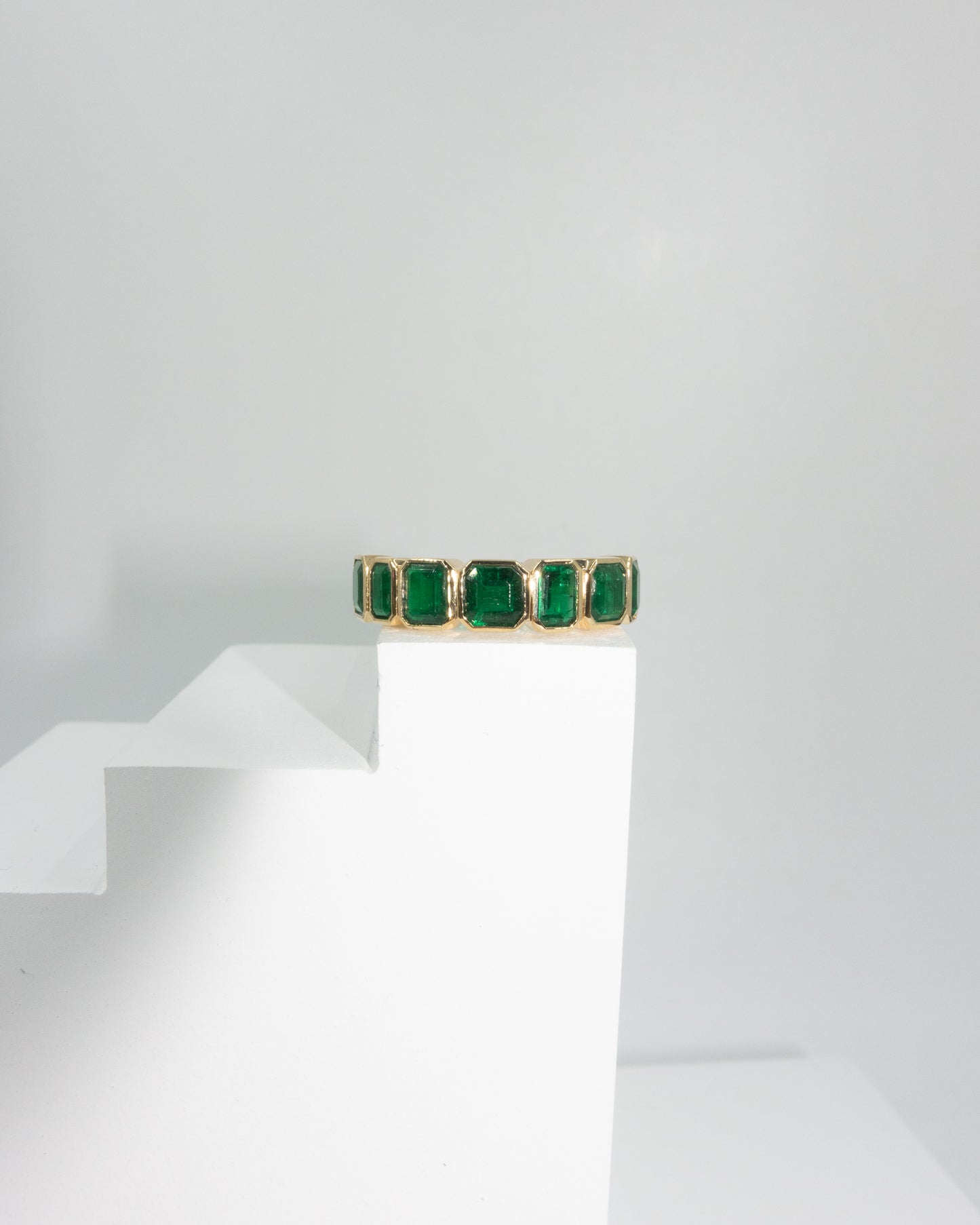 Multi Size Muzo Green Zambian Emerald Eternity Ring
