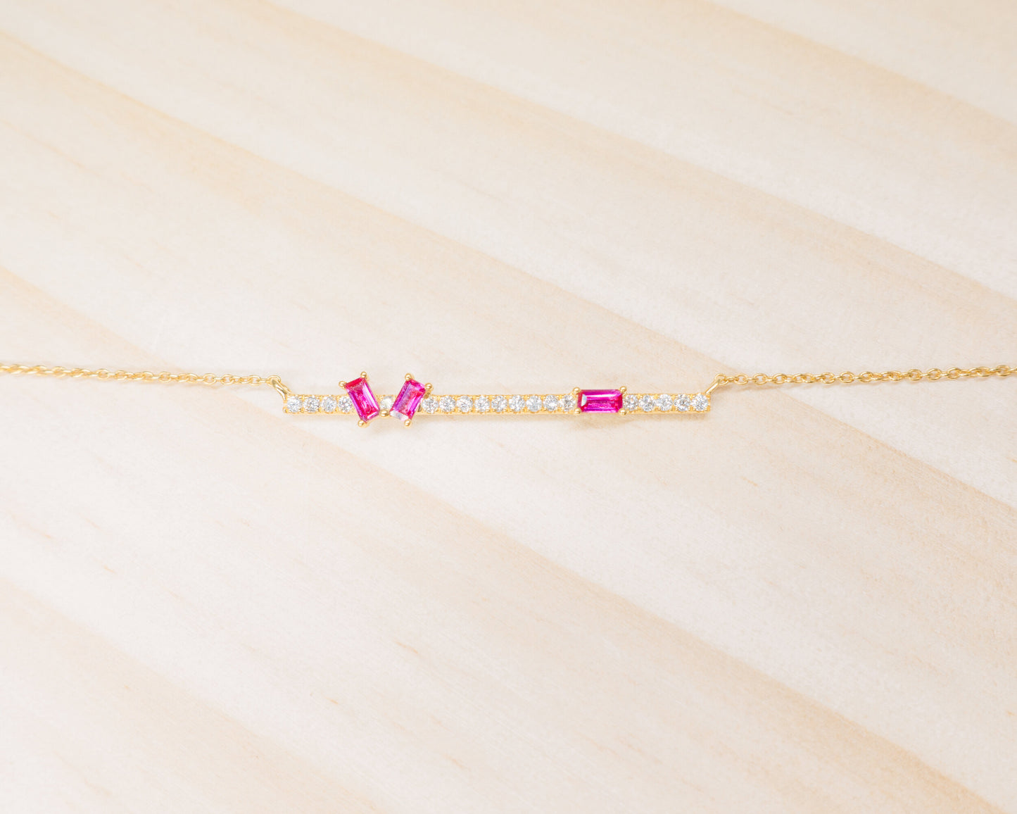"Aurora" baguette cut ruby with diamond bar necklace