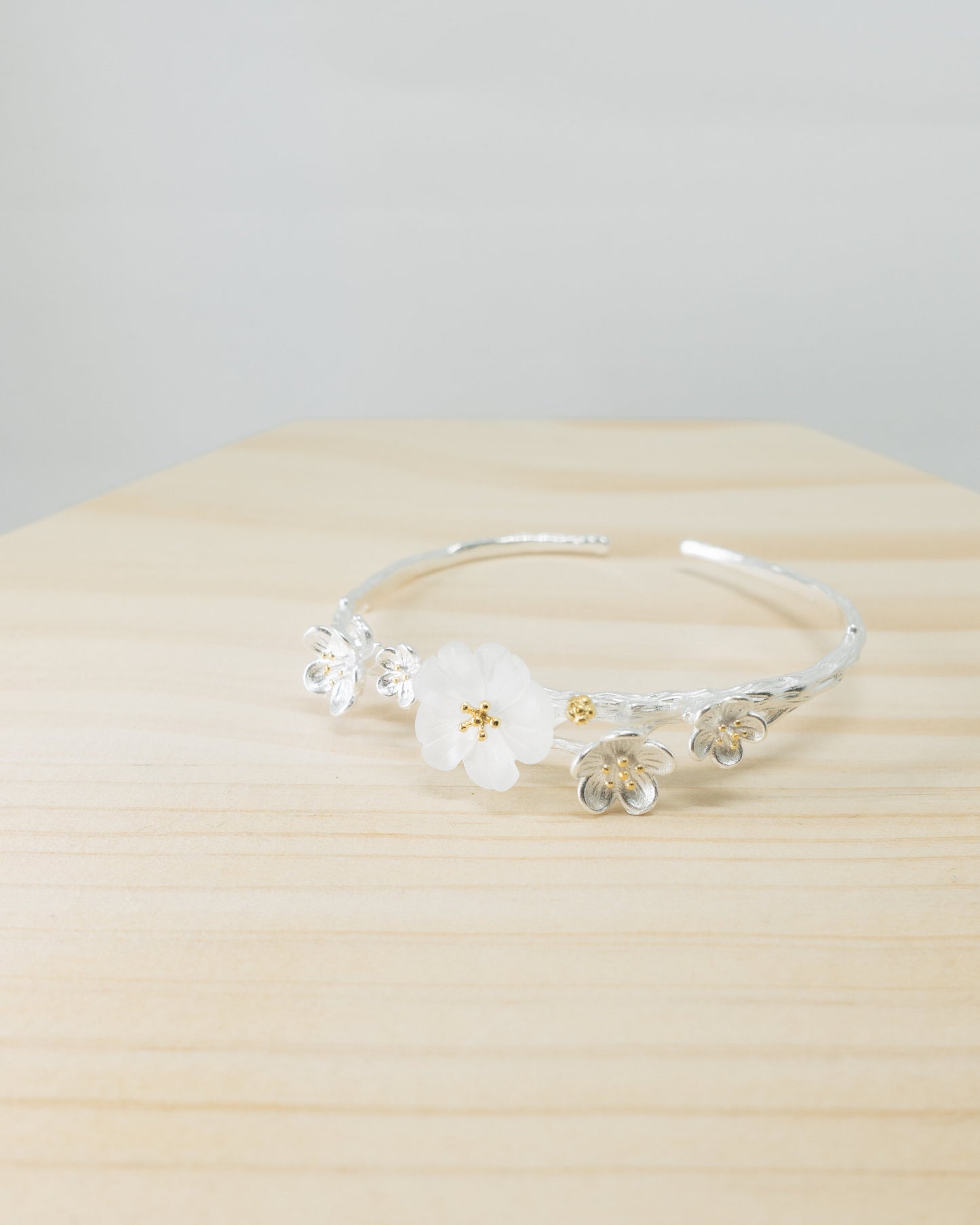 "Hanami" crystal floral open bangle