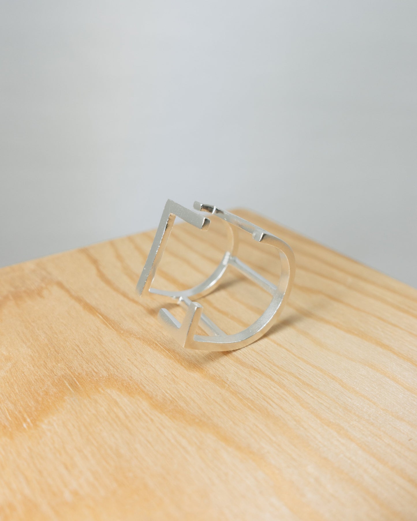 "Hazel" geometric cage ring