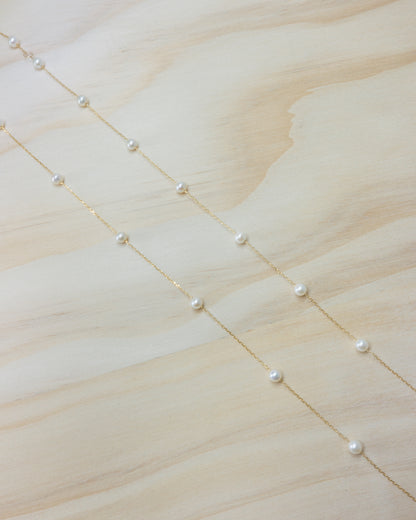 Floating petite pearl necklace