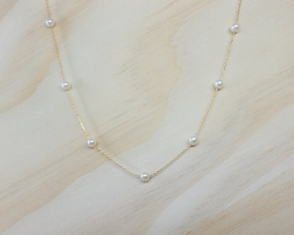 Floating petite pearl necklace